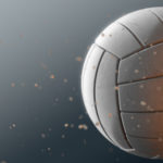 volleyball thumbnail A dirty white volleyball caught in slow motion flying through the air scattering sand particles in its wake - 3D render