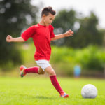 Little Boy Shooting at Goal Little Boy Shooting at Goal